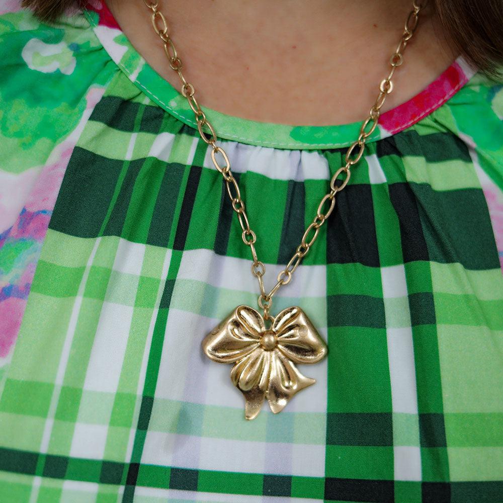 Sasha Bow Pendant Necklace in Worn Gold - Canvas Style