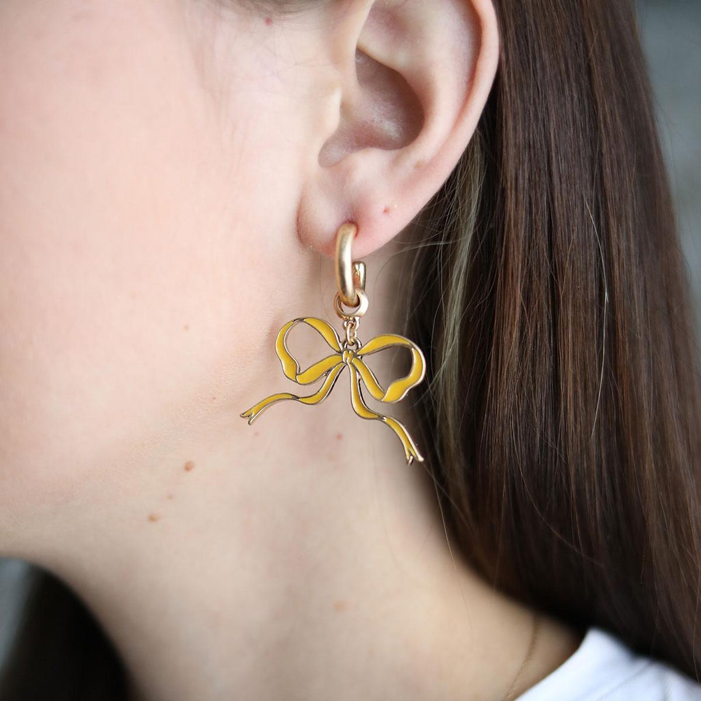 Veronica Game Day Bow Enamel Earrings in Yellow - Canvas Style